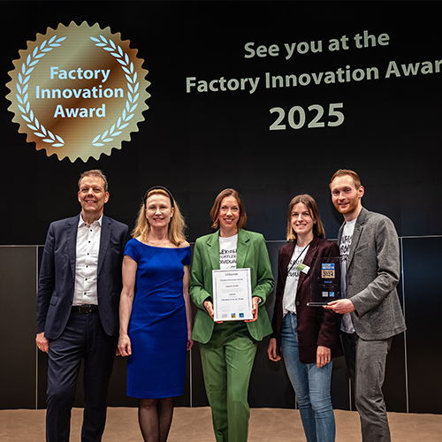 engomo team receiving award on stage at the Factory Innovation Award 2025 during Hannover Messe