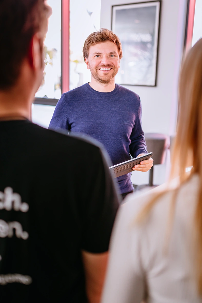 Jens Stier, CEO of engomo GmbH, smiling at the camera.